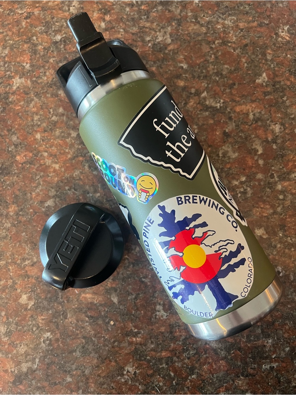 Yeti Olive Green Rambler Bottle with Black Lid and Multicolor Stickers